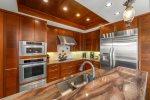 Whether youre cooking or just enjoying a cocktail, this space delivers function and flair